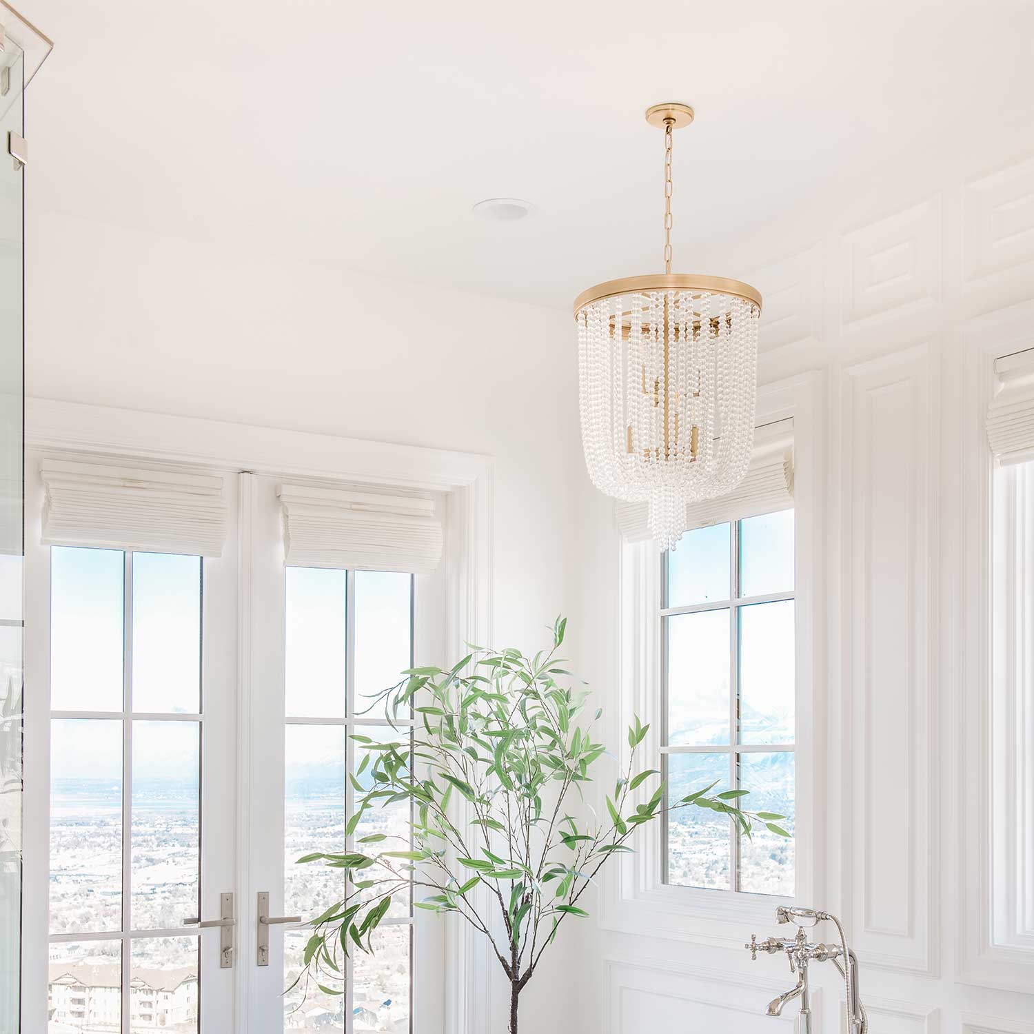 Royalton - Lustre chic en laiton ou acier et pampilles