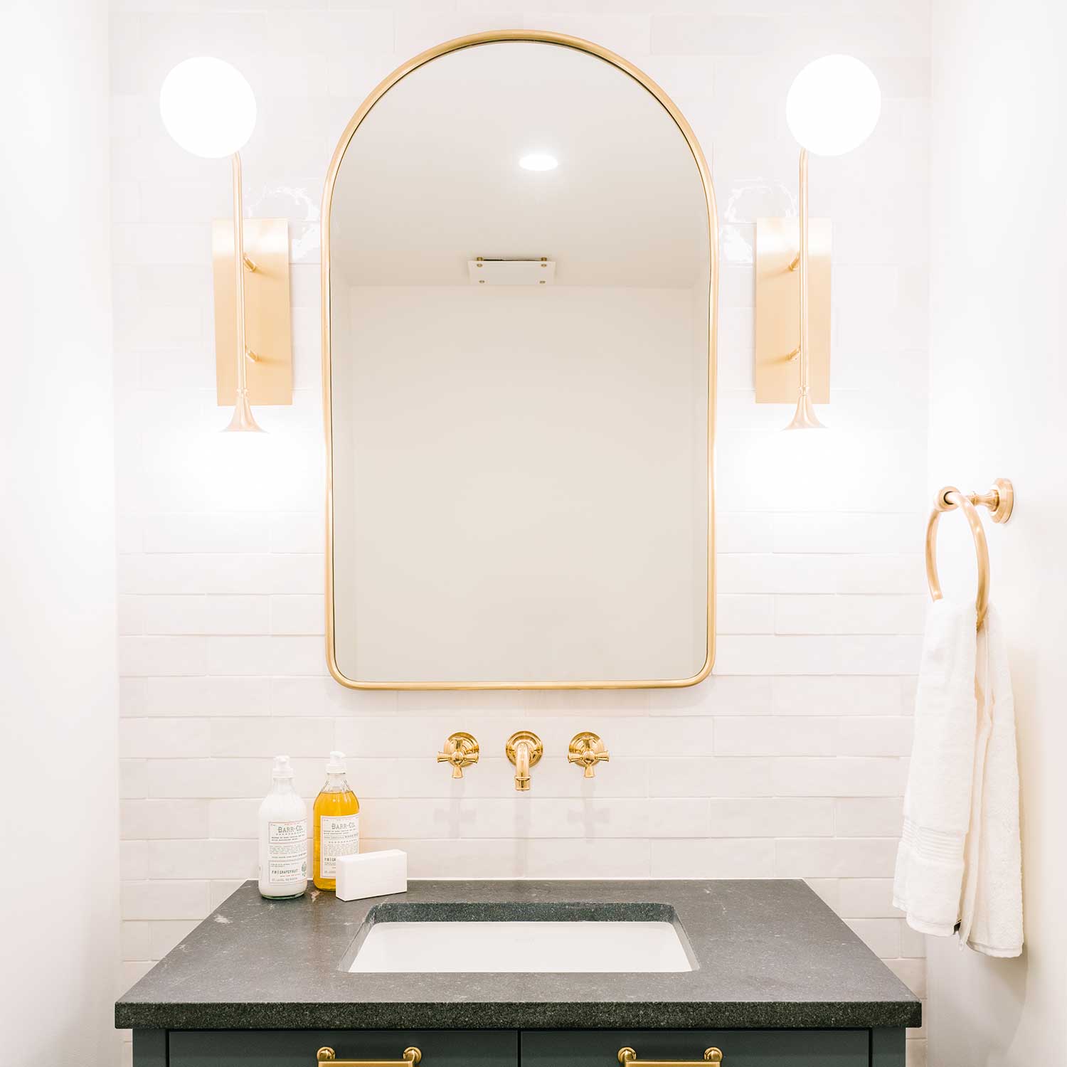 Fleming - Gold wall sconce with chic glass globe