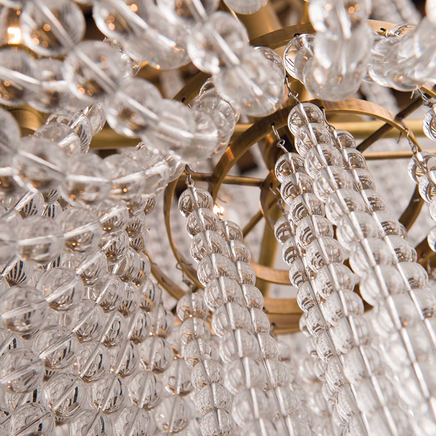 Royalton - Chic chandelier in brass or steel with pendants