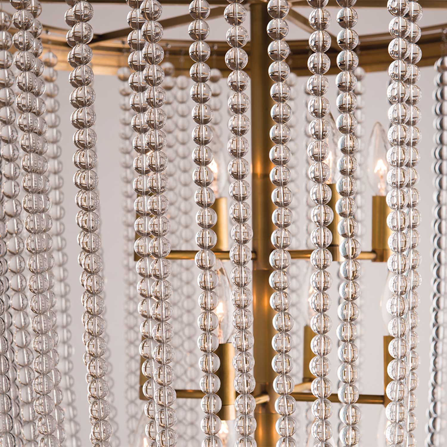 Royalton - Chic chandelier in brass or steel with pendants