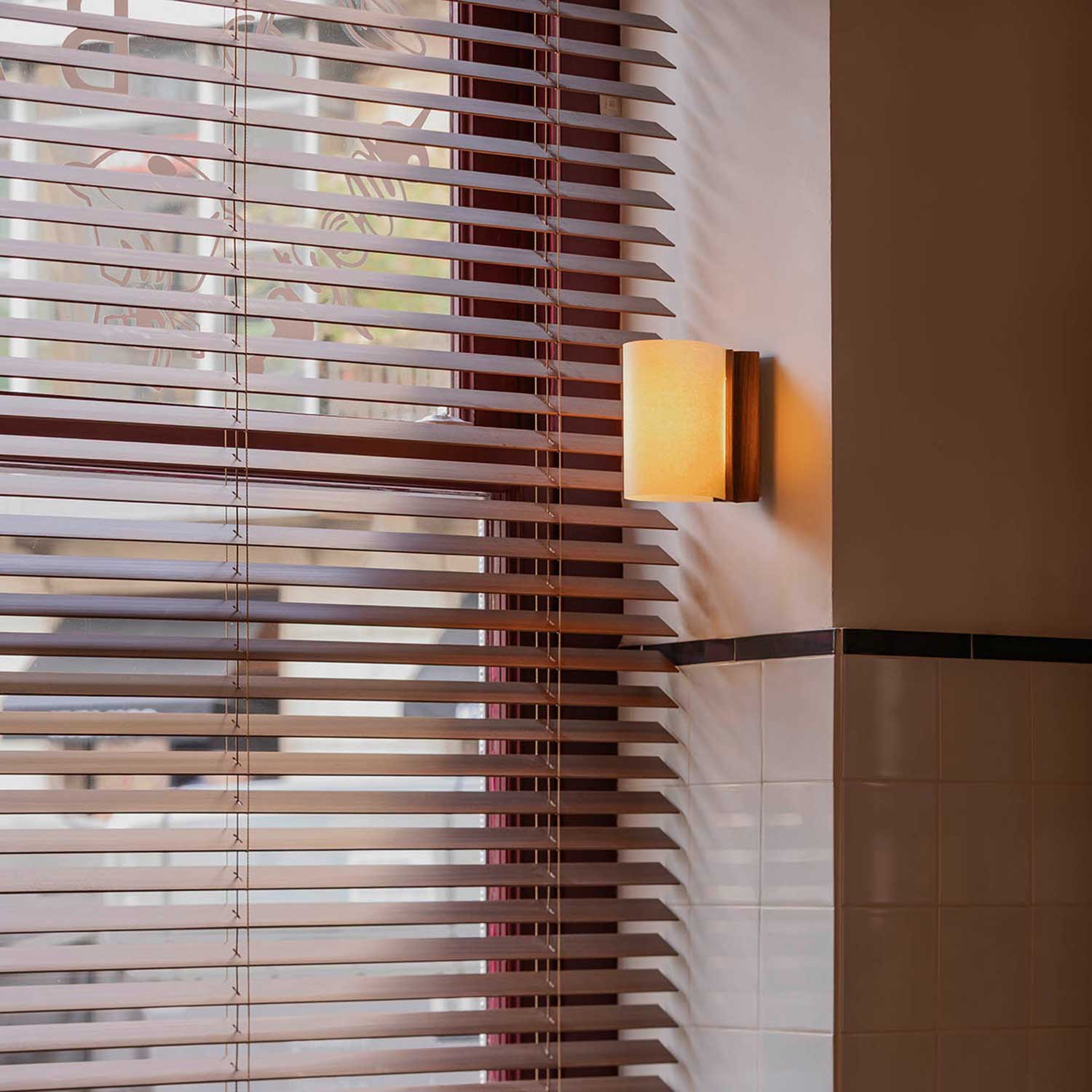 Cata - LED wall light in walnut and fabric design