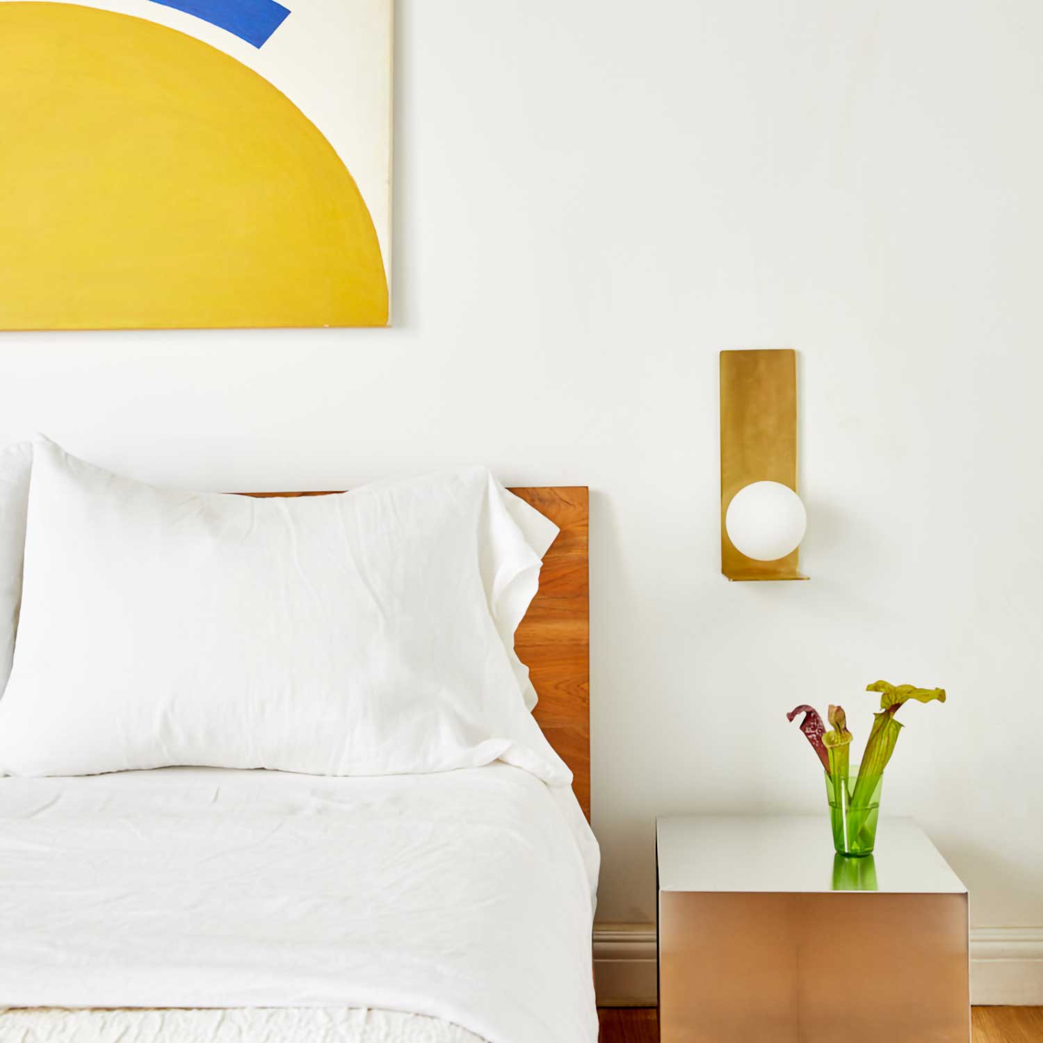 Lani - Golden design wall sconce with glass globe