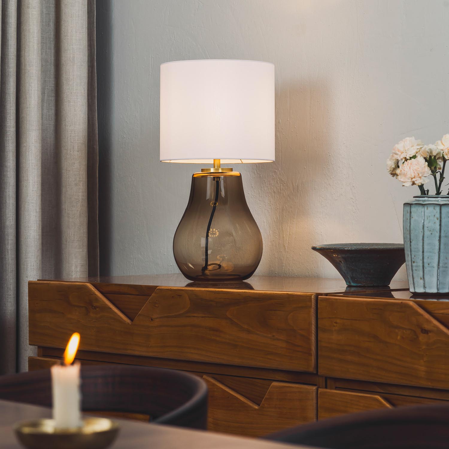 HITRA - Pear-shaped bedside lamp in blown glass and fabric lampshade