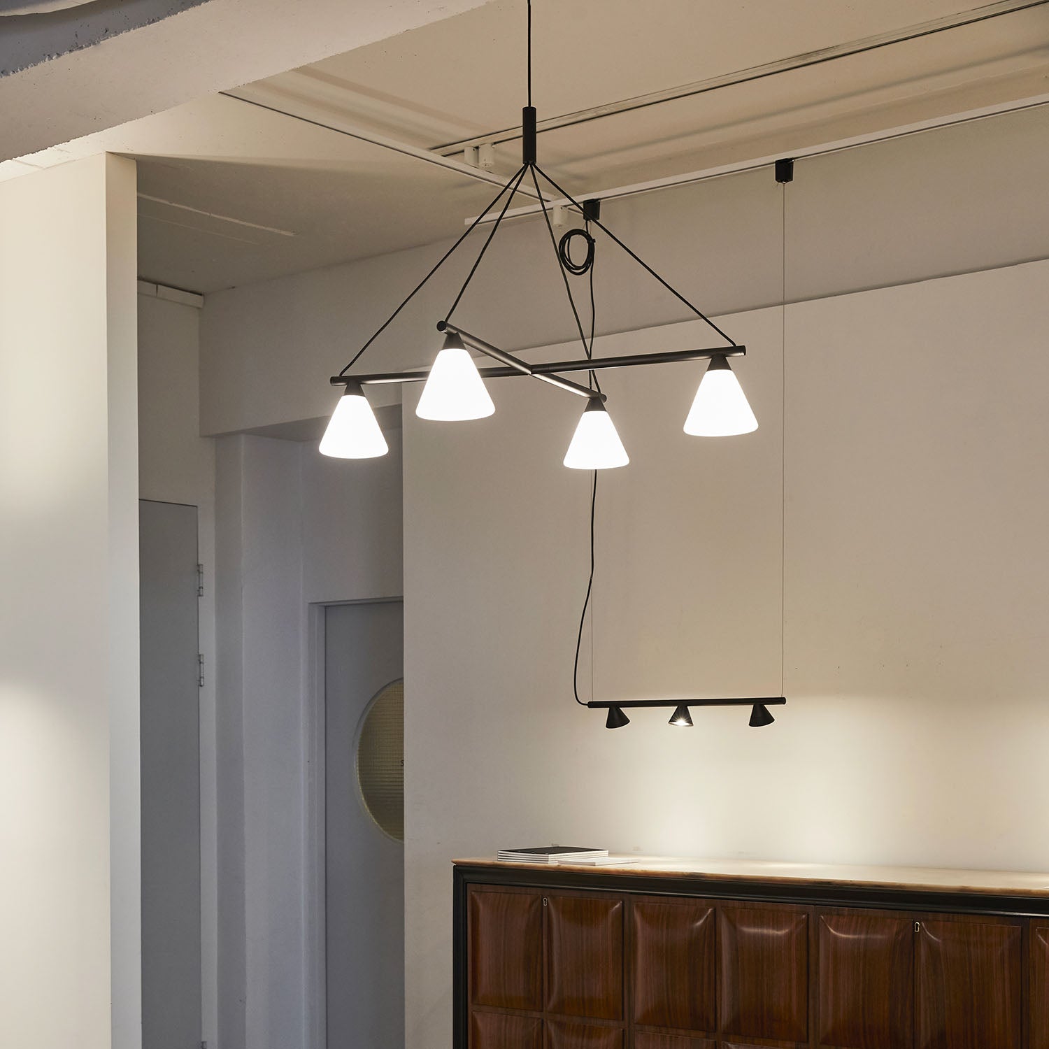 PROBE - Modern black steel chandelier, white glass cones