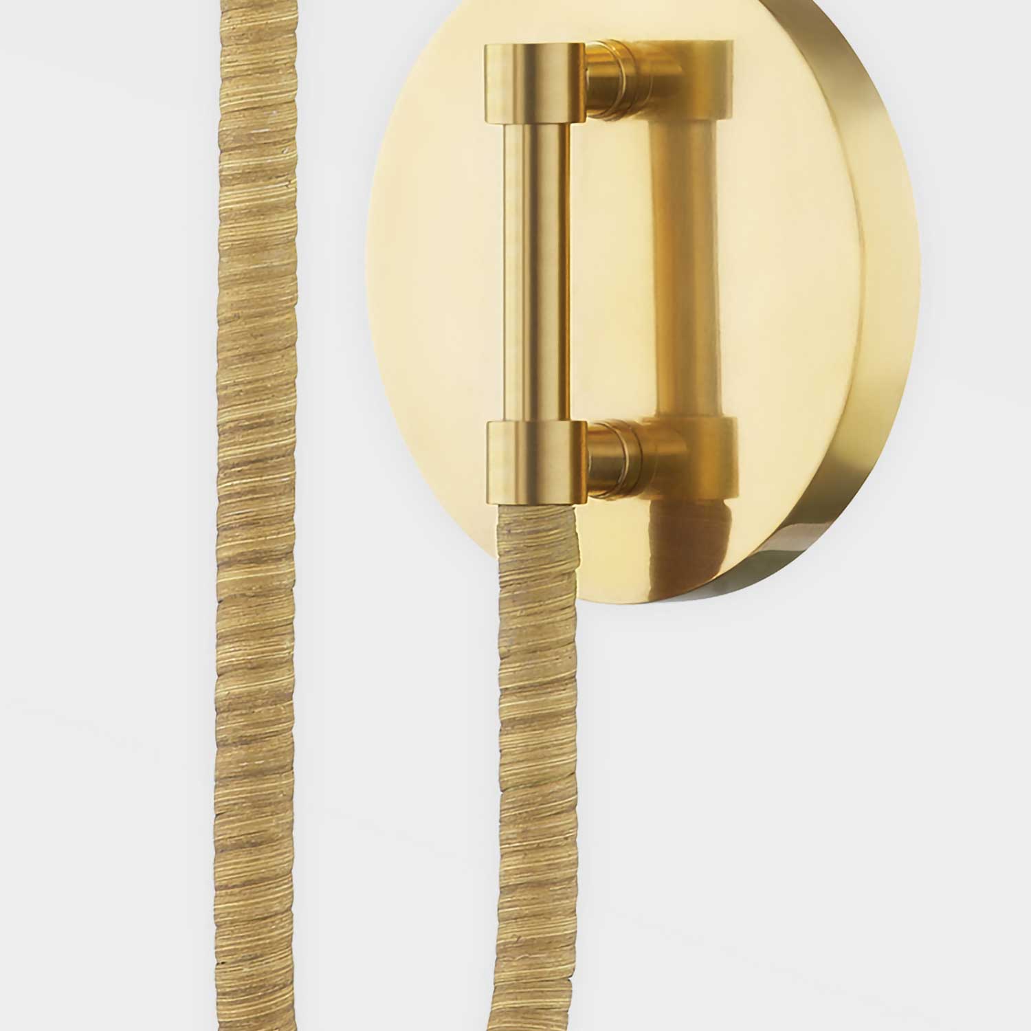 Ripley - Gold and rattan wall light for interior use