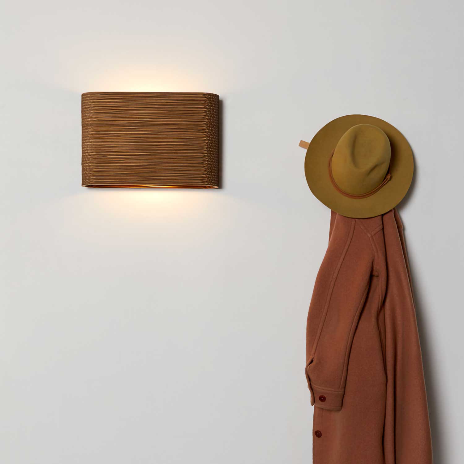 Skew - Designer wall light made from recycled cardboard for the bedroom