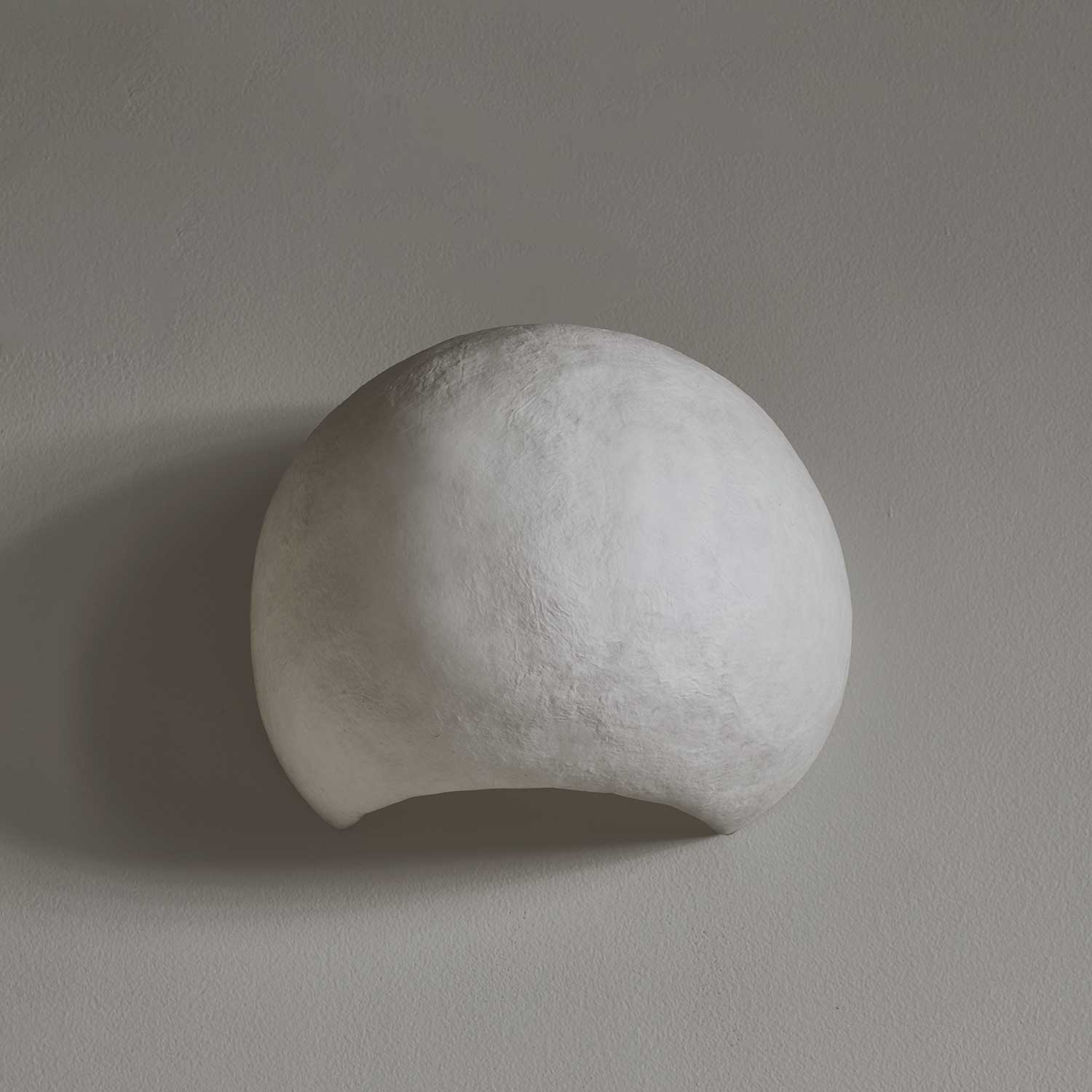 Pebble – Wabi-Sabi-Wandleuchte im Kieselstein-Design