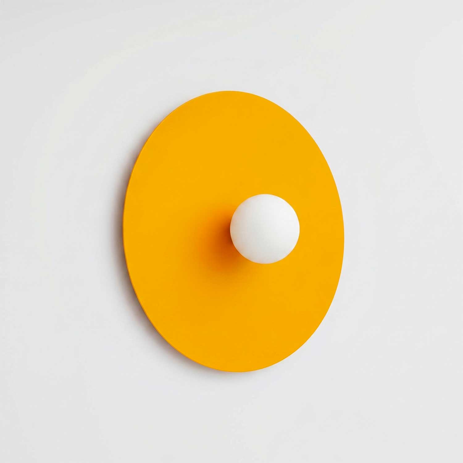 Revati - Applique murale ronde design en acier coloré pour salon